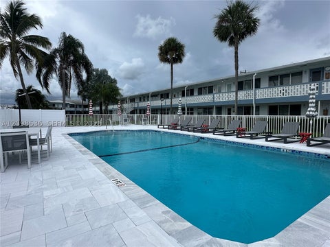 Photo of 801 Atlantic Shores Blvd #107, Hallandale Beach, FL 33009 (MLS # A12098536)