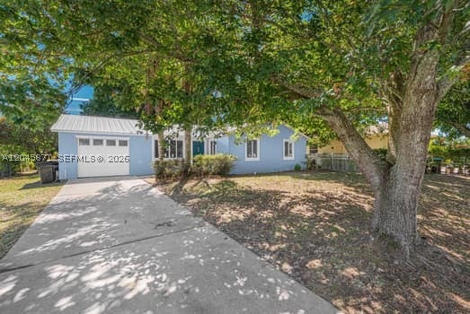 Photo of 3185 SW Crumpacker St, Port St Lucie, FL 34953 (MLS # A12045871)
