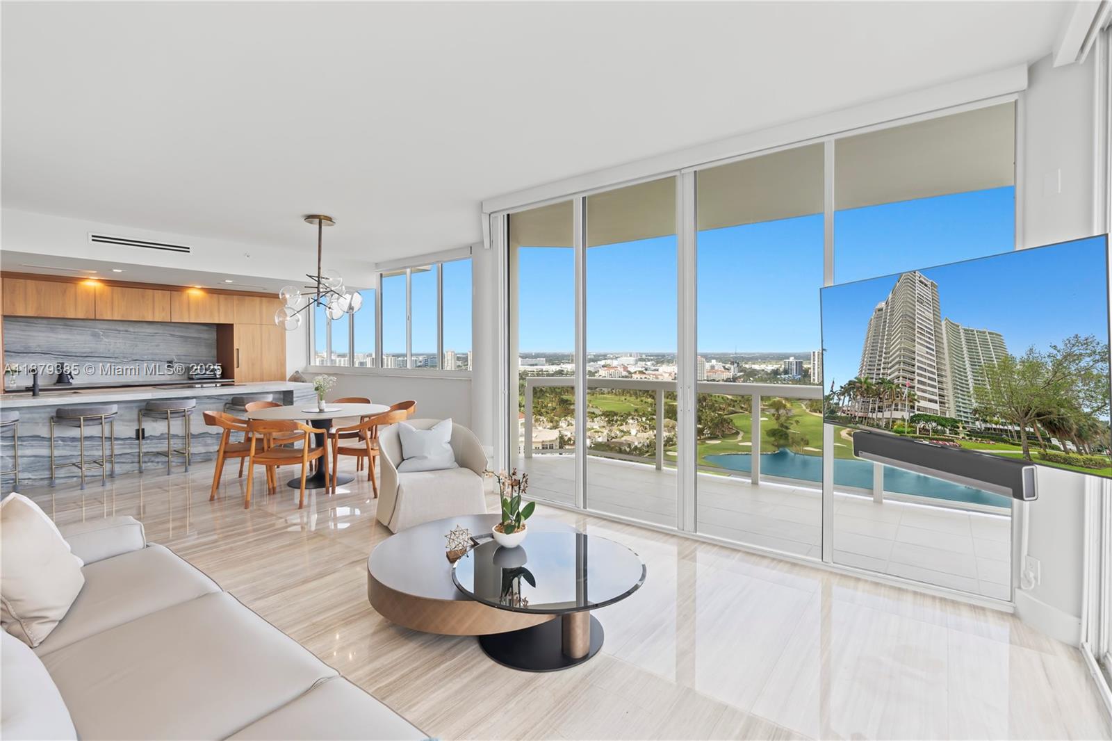 Immaculate, custom-renovated 2BD/2BA corner penthouse with high ceilings, abundant light, and stunning ocean, golf, lake, and sunset views. New electrical, LED recessed lighting, Italian marble, and European Oak in the primary. Phillip Jeffries Granite feature wall elevates the living room. Open kitchen with GE Profile appliances, Miele dishwasher, walnut cabinetry, marble counters, and under-sink water filter. Spa-style primary bath with freestanding tub, separate shower, and frameless full-length mirror. California Closets wardrobes in both bedrooms. Guest room’s CLEI LGM revolving bookcase reveals a queen bed. Balcony access from every room. Must be seen to appreciate! The Landmark, a prestigious building to enjoy strolls in “the circle”. Close to the beaches, restaurants and shopping.