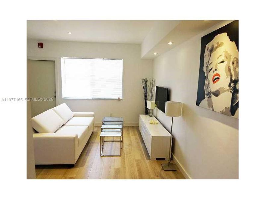 Great unit with wood floors, modern kitchen and stainless steel appliances, bathroom and new bedroom furniture. Turn key. Located on the 1st floor. For rent completely furnished with queen bed in bedroom. LCD high definition 42 inches tv. All furniture included. Easy to show. Washer and Dryer in the building. First, last and Security. NO PETS, YEARLY ONLY. EASY TO SHOW.