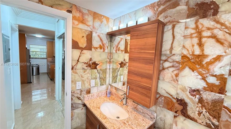 Welcome to your South Beach retreat! This 560 sq. ft. first-floor condo offers 1 bedroom, 1 bathroom, abundant natural light, and a smart layout. Enjoy an updated kitchen with dishwasher, stove, oven, and in-unit washer/dryer. Oversized bedroom feature generous closets, with individual wall A/C units for comfort. Two entry doors add flexibility, plus access to a common courtyard and available parking. Unit #1 next door is also for sale—combine for a larger residence or keep separate with connecting access. Low HOA fees, option to be delivered furnished, and just two blocks from the beach and Ocean Drive. Units #1 and #2 in this building are sold as a COMBO package. Total combined SQ Footage 1,460 (3 bedrooms, 3 full bathrooms, 2 kitchens, two living​​‌​​​​‌​‌​​​‌‌​​​‌‌‌​​‌​​‌‌​​​​ rooms)