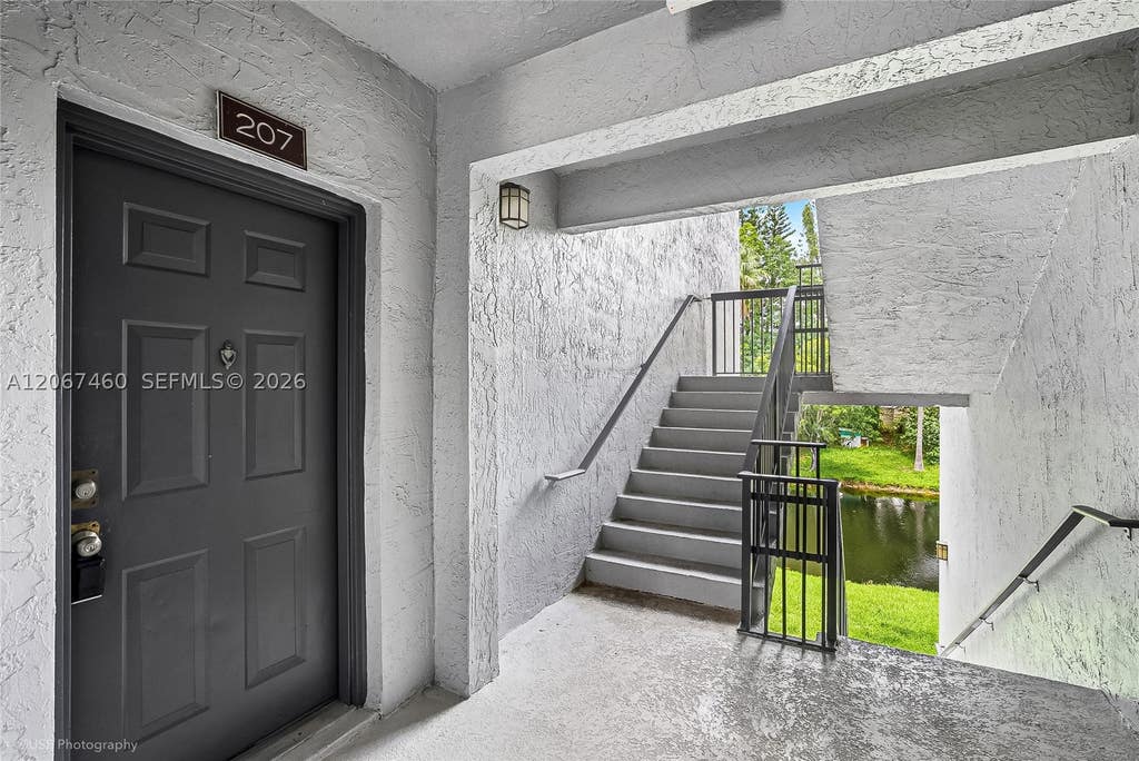 Photo of 11205 W Atlantic Blvd #207, Coral Springs, FL 33071 (MLS # A12067460)