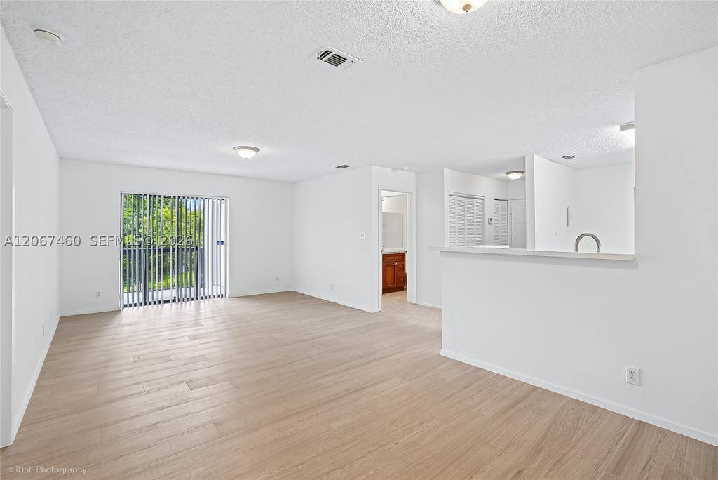 Photo of 11205 W Atlantic Blvd #207, Coral Springs, FL 33071 (MLS # A12067460)