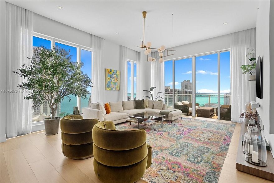 This beautifully renovated 3-bedroom + den, 4.5-bath condo on exclusive Brickell Key offers stunning water views from nearly every room. Situated in a gated island community with 24-hour security, the home features soaring ceilings, sleek finishes, and expansive floor-to-ceiling windows that flood the space with natural light. Enjoy four spacious terraces with panoramic views of the serene waterfront, lush greenery, and iconic Miami skyline. The gourmet kitchen, with top-tier appliances and custom cabinetry, is perfect for entertaining. The master suite includes a private terrace, walk-in closet, and a spa-like bath with soaking tub, and glass-enclosed shower. Additional amenities include tennis courts, a resort like pool, basketball & squash court, and a fitness center.