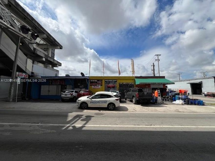 located in a high-traffic, rapidly developing corridor. The property was previously operated as a grocery store and offers a flexible open layout suitable for retail, market, convenience store, or restaurant use. The space includes an existing grease trap that only requires servicing, along with a walk-in cooler, making it especially attractive for food and beverage operators looking to minimize build-out time and costs. Positioned on a busy street with strong daily vehicle and pedestrian traffic, the property benefits from excellent visibility and accessibility. Directly across the street are newly constructed apartment buildings, adding significant residential density and creating a built-in customer base for future tenants. This is a strong opportunity for businesses seeking a well-located space in an area experiencing continued growth and redevelopment.