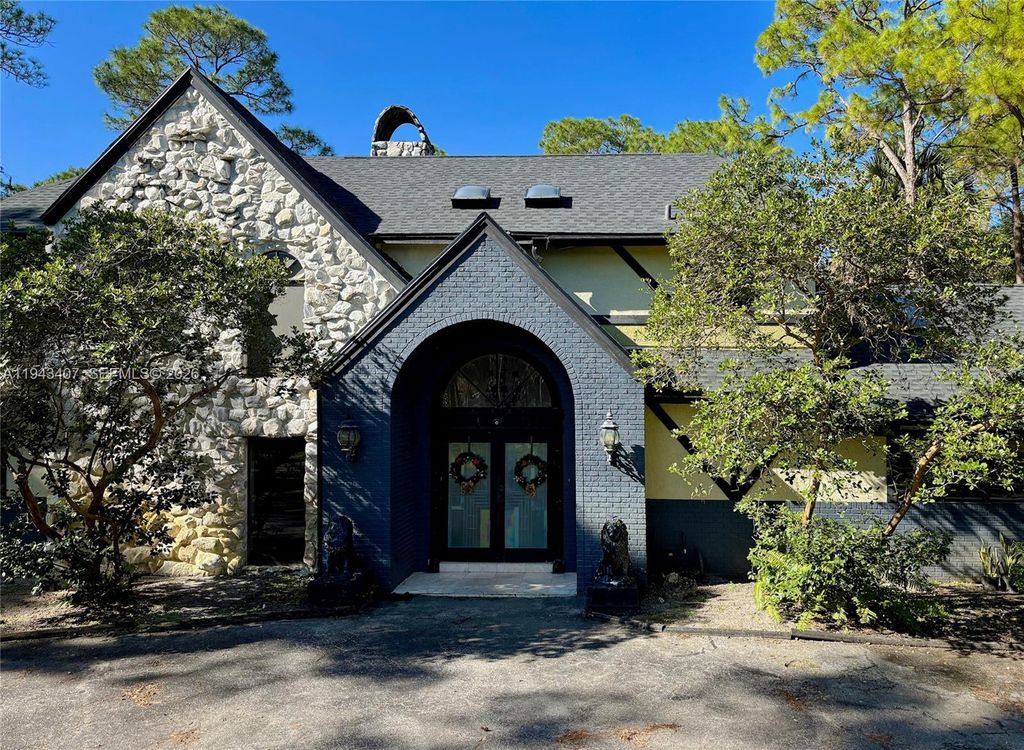 Photo of 1339 Gallop Dr, Loxahatchee, FL 33470 (MLS # A11943407)