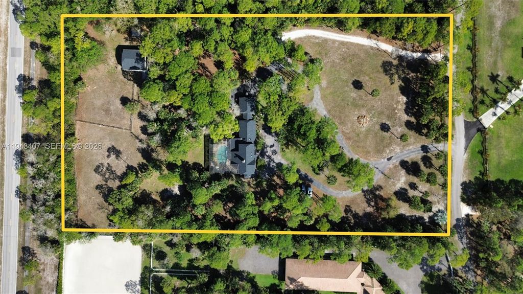 Photo of 1339 Gallop Dr, Loxahatchee, FL 33470 (MLS # A11943407)