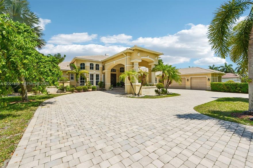 This premium 1.18 acre lot is one of the LARGEST lots in the gated community of Country Glen. Home features 6 bright bedrooms plus an office, 4 full baths and 2 half baths. Highly sought-after 1 floor model home with high ceilings and spacious layout. Open and inviting kitchen with 2 islands and stainless-steel KitchenAid appliances overlooking the backyard. Recently screened patio with a summer kitchen is just perfect to enjoy and entertain. The pool was resurfaced and had the water heater and salt system installed in 2022. This oversized lot is big enough to build a pickle ball, half basketball court or mini golf, the opportunities are limitless! The grand entrance features a spacious circular driveway with an elegant porte cochere and 3 car garages which any car collector will love. Community includes amenities such as 2 tennis courts, basketball court, Volleyball court and children's playground. Great location close to top-rated schools, shops, main highways, parks and restaurants. A home like this is rarely available so it is a must see!