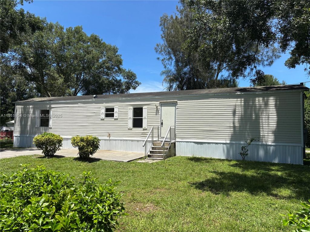 Photo of 6505 Seventh St, Okeechobee, FL 34974 (MLS # A11915954)