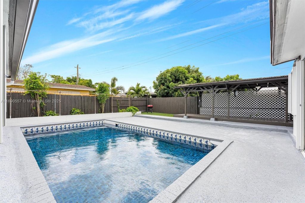 Photo of 7760 NW 34th St #A, Davie, FL 33024 (MLS # A11690557)