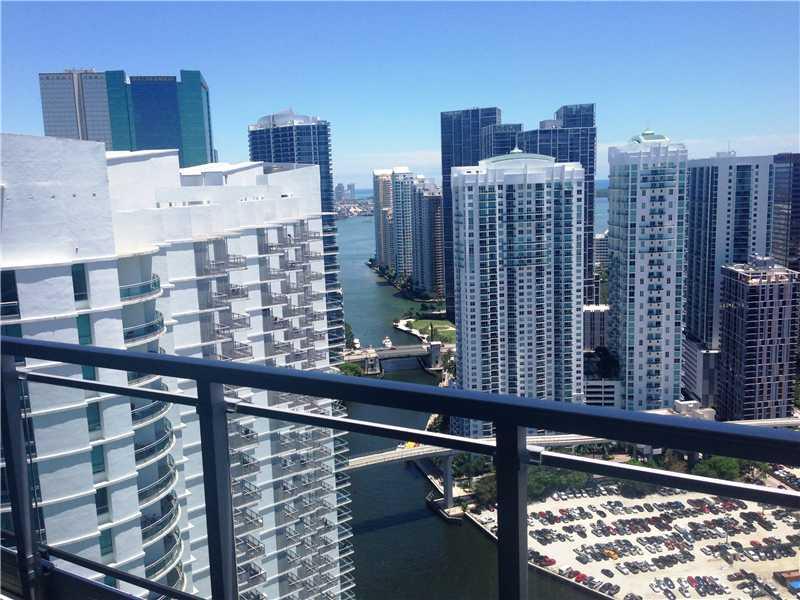 Enjoy a magnificent & relaxing setting w/ incredible views of the Miami Skyline, ocean, river & surrounding city lights. Views are appreciated frm every rm in this beautiful & modern fully furnished 2Bd/2BA w/ wood floors, European cabinetry, S.S.applianc es, walk-in-closets, W/D in unit. Amenities: pool, spa, gym sauna, media/party rm, 24hrs security in a gated community. Only minutes frm Mary Brickell Village, entertainment, business districts, major highways, Metromover, Bch & Airport. No pets allowed.