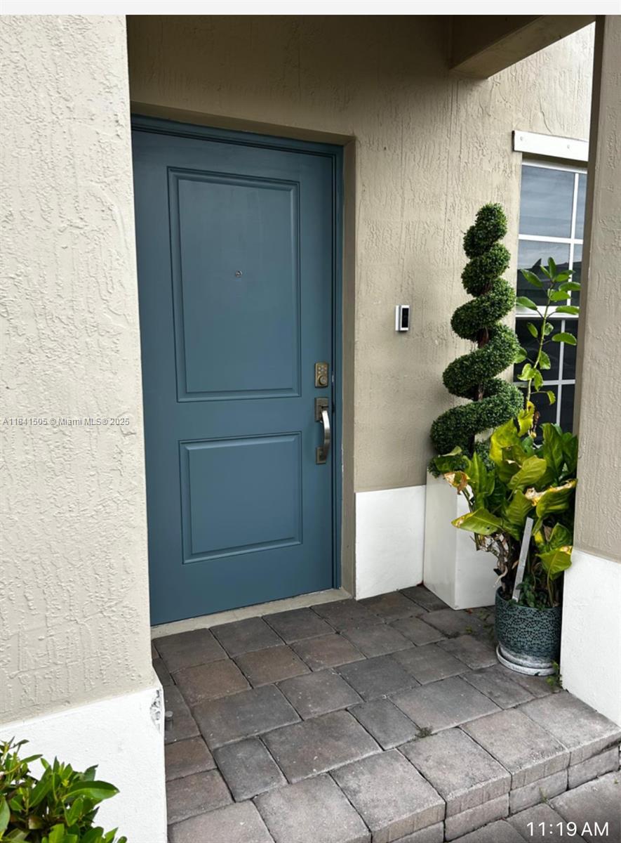Spacious modern two story townhouse four bedrooms three bathrooms one bedroom and full bathroom downstairs, private patio with outdoor kitchen, stainless steel appliances, two parking spaces assigned and lots of visitors parking, community pool, clubhouse, gym, playground.