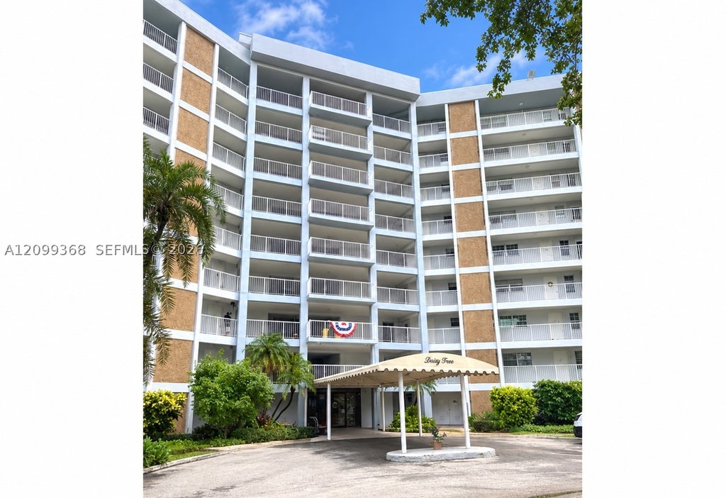 Photo of 2940 N Course Dr #110, Pompano Beach, FL 33069 (MLS # A12099368)