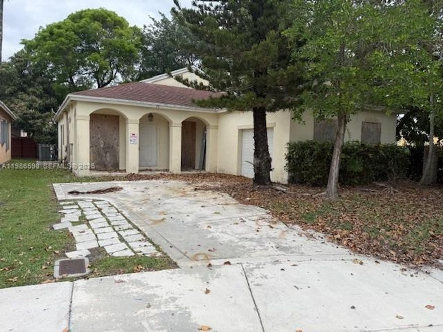Rare "fixer-upper" opportunity at the quiet end of a cul-de-sac in the heart of Homestead historical area. This 1,520 SF home features a 2-car garage on a 5,816 SF lot. Ideally located within walking distance to City Hall and the Seminole Theatre. Bring your vision to renovate this into a flagship residence.