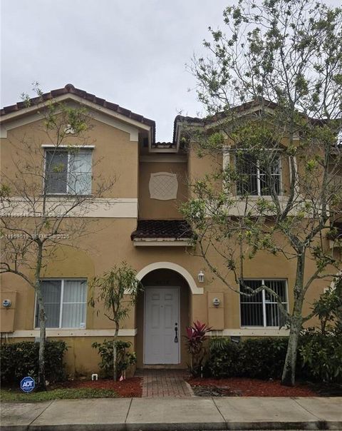 Photo of 6026 Woodlands Blvd, Tamarac, FL 33319 (MLS # A11959513)