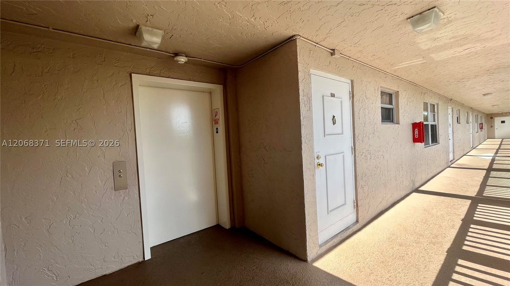 Photo of 1200 NW 87th Ave #413, Coral Springs, FL 33071 (MLS # A12068371)