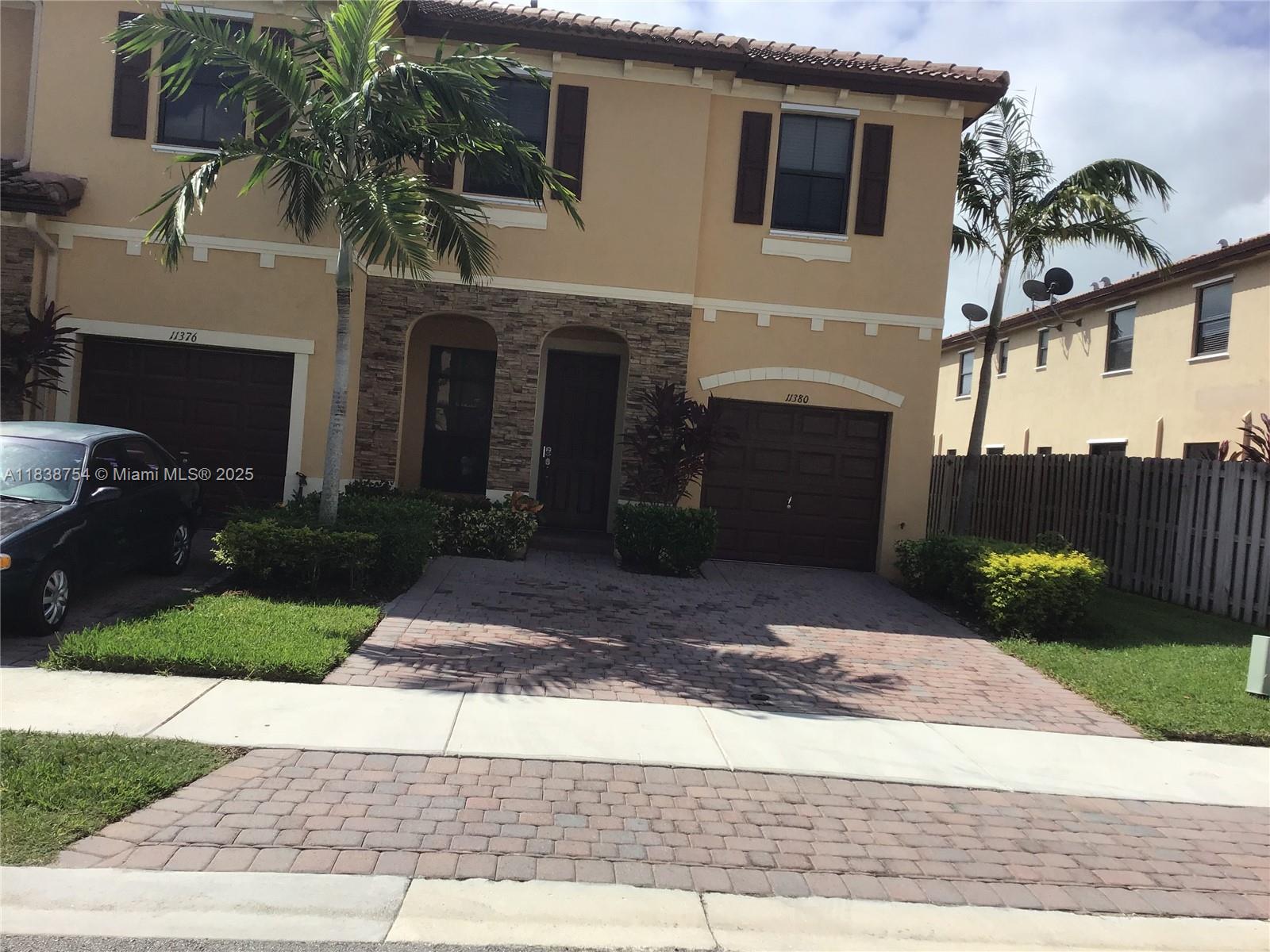 Silver Palms Beautiful and Pristine Corner 3/2.5 Townhome with 1 car garage, auto garage door with keypad entry. Great floorplan with separate living, family room & dining combined and open onto a fenced paved backyard area ideal for BBQ! Tile downstairs and lovely wood on stairs and all bedrooms on second floor! Large Master with walk in closet. Driveway parks 2 cars and guest parking directly in front of unit! Great family community with resort style clubhouse with oversized pool, spa, children's splash zone, basketball playground, his and her's saunas, fitness center, kids’ playroom and resident party room, 12 minutes to Baptist hospital. Close to schools, shopping & highways! Very easy to show!
