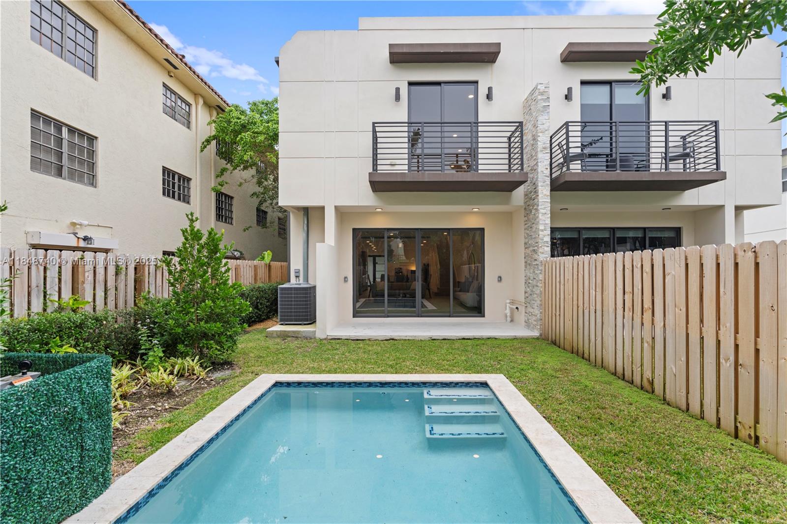 Step inside these stunning, brand-new townhomes, never lived in and thoughtfully designed to exceed expectations. Enjoy an open-concept layout with soaring ceilings, a spacious kitchen that seamlessly flows into the living and dining areas, and a fenced backyard with a pool perfect for entertaining. There’s even a summer kitchen hookup to elevate your outdoor gatherings. Located just minutes from Las Olas, the beach, and steps from Holiday Park, these homes offer the perfect blend of luxury, comfort, and convenience.