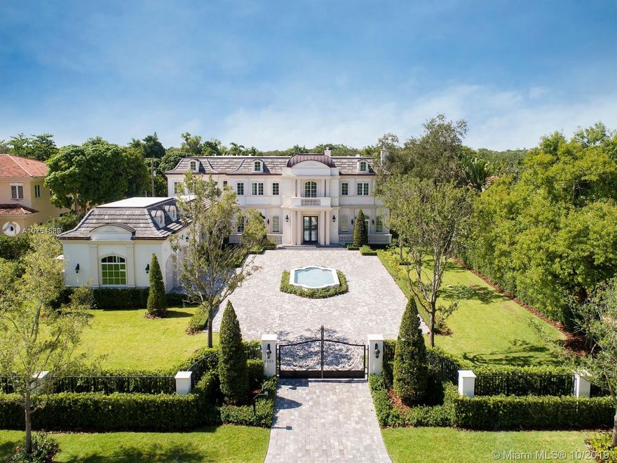 Brand New Château des Fontaines, a French splendor designed by renowned architect Ramon Pacheco. Located in the epicenter of N Pinecrest, this blissful home is ideal for mid-summer night swims or a romantic cocktail party w/ elegant backyd amenities including azure pool, Jacuzzi & fountains, outdr terrace & fully equip summer kit. There’s no shortage of space w/ custm aesthetics carried throughout, such as marble flrs, high ceilings, chandeliers, fireplace, elevator, oak-paneled office & custm chef’s kit w/ beautiful marble countertops, Miele & Subzero apls. Dual master ste w/ his/her walk-in closets allow for ground or second level option. Xtra features: Gated,450 bottle wine cellar, 3 car gar. w/ space for 3 lifts, Full Generator. VISIT OUR PROPERTY VIDEO: https://youtu.be/dAhmiWe8vsA