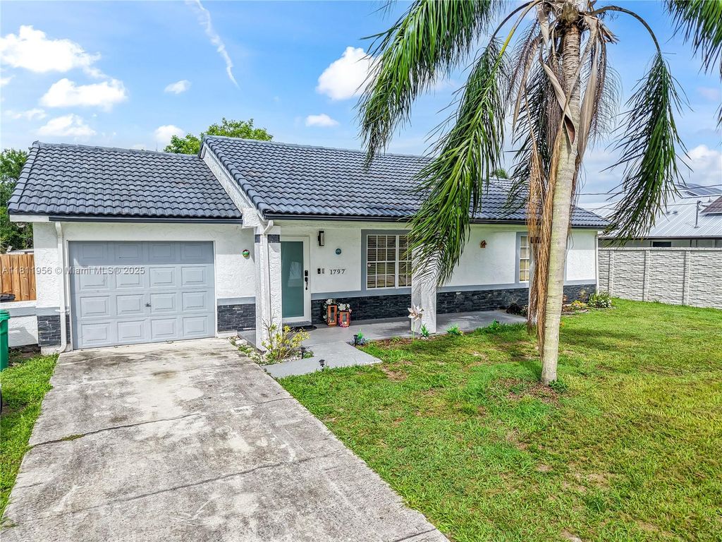 Photo of 1797 SW Hampshire Ln, Port St Lucie, FL 34953 (MLS # A11811956)