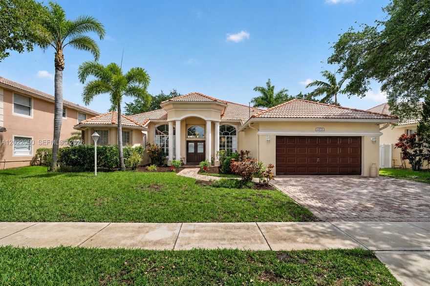 YOUR FUTURE HOME AWAITS in the highly desired community of Edgewater in PEMBROKE FALLS! This beautifully maintained one-story Monterey model features a desirable triple-split floorplan with 4 bedrooms, a private office, 3 full bathrooms & a 2-car garage. Soaring 12-foot ceilings and abundant natural light welcome you to inviting living spaces designed for both everyday comfort and entertaining. You will love the elegant formal living & dining rooms, the spacious family room & the charming breakfast nook overlooking the open kitchen featuring a new refrigerator, Wolfe gas stove with externally vented hood, pantry, undercabinet lighting & recessed lighting, double sink & NEW butcher block countertops on the island & coffee bar. Retreat to the oversized primary suite featuring double-door entry, two walk-in closets, sliding doors & a spacious ensuite bath with soaking tub, dual vanities & step-down shower. Secondary bedrooms offer blackout window treatments, ceiling fans & ample closets. Additional upgrades include GE W/D, NEW garage cabinetry, mini split A/C, gas-powered water heater, dual-zone A/C systems, accordion shutters, impact-rated front door & garage door, gutters, Rainbird irrigation system, pavers & shaded outdoor seating areas with exterior ceiling fans. Ideally located near schools & everyday conveniences. You will enjoy resort-style amenities including: gym, heated pool & spa, Tot-Lot, tennis, basketball, pickleball, ballroom. HOA covers internet, cable & ADT.