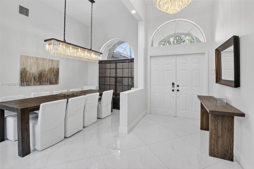 Photo of 1221 NW 141st Ave, Pembroke Pines, FL 33028 (MLS # A11979011)