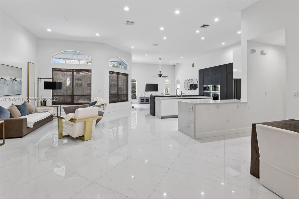 Photo of 1221 NW 141st Ave, Pembroke Pines, FL 33028 (MLS # A11979011)