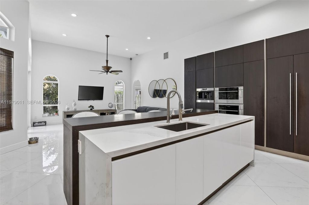 Photo of 1221 NW 141st Ave, Pembroke Pines, FL 33028 (MLS # A11979011)