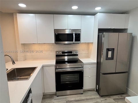 Photo of 10304 Sunrise Lakes Blvd #209, Sunrise, FL 33322 (MLS # A12084336)