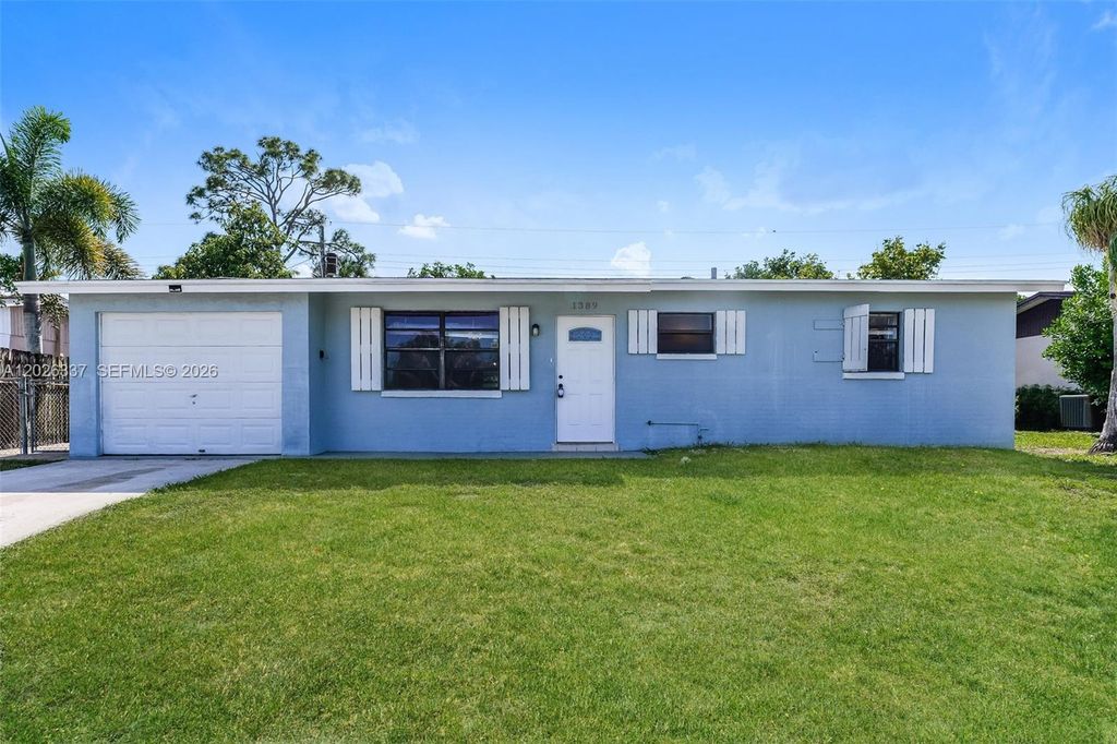 Photo of 1389 Meadowbrook Dr, West Palm Beach, FL 33417 (MLS # A12026337)