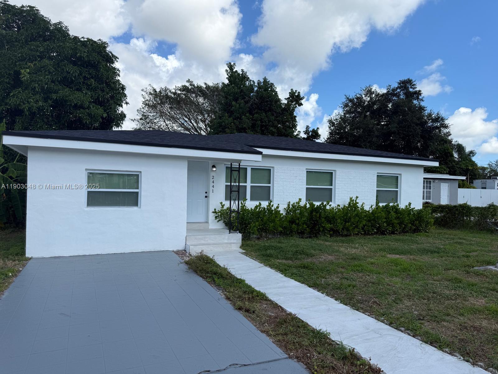 4 Bedroom 2 Bath house complete renovation. NEW Roof Kitchen bathrooms electrical plumbing impact windows and doors