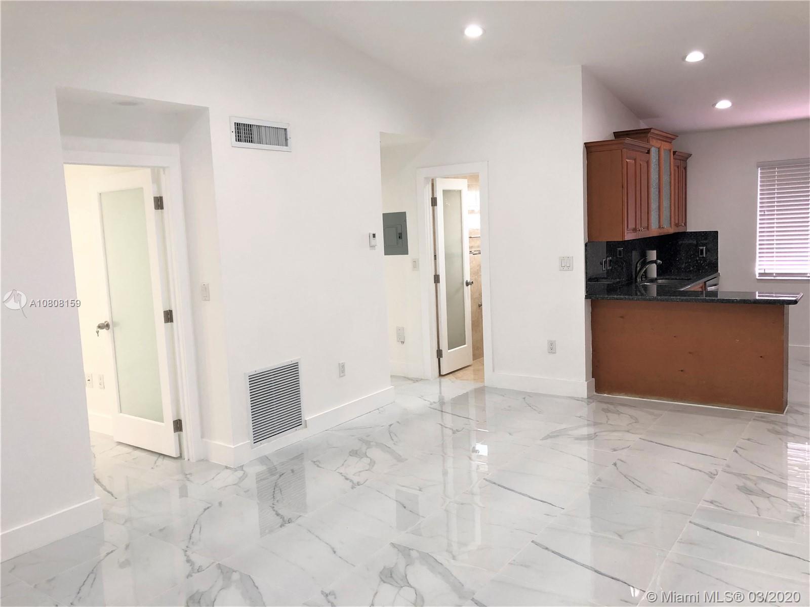 DORAL COURT CONDO - Residential Lease