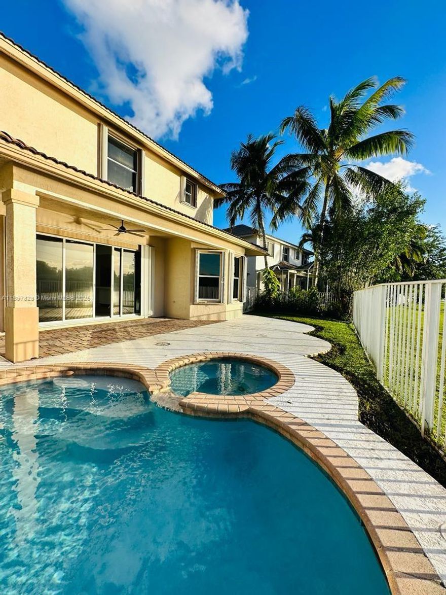 Beautiful REMODELED 6 bedrooms, 5 bathrooms and 4 car garage house located at the prestigious community of  Weston Hills Country Club. Come and enjoy the astonishing sunsets from the pool side, while viewing the peaceful  canal. Fenced backyard. Top of the line finishes all around the home, starting from its modern kitchen with all new cabinets, calacatta quartz countertops and stainless-steel appliances. Modern ceramic tiles all throughout the first  floor and stairs, plus laminated floors upstairs. Contemporary bathrooms. Built in closet plus laundry room  upstairs. This community offers a variety of amenities, including a golf course, tennis courts, a clubhouse, and a  community pool. Weston Hills is also home to some of the best schools in Broward County. HURRY IT WON’T  LAST!!