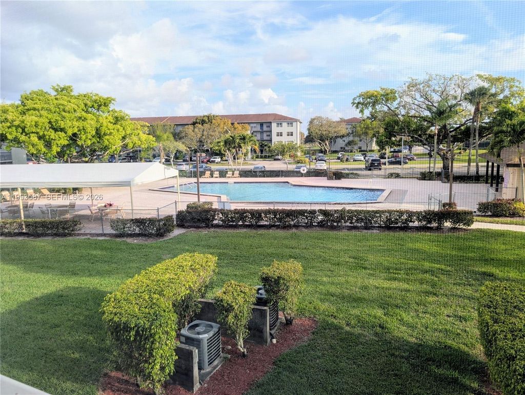 Photo of 151 SW 135th Ter #212T, Pembroke Pines, FL 33027 (MLS # A11993587)