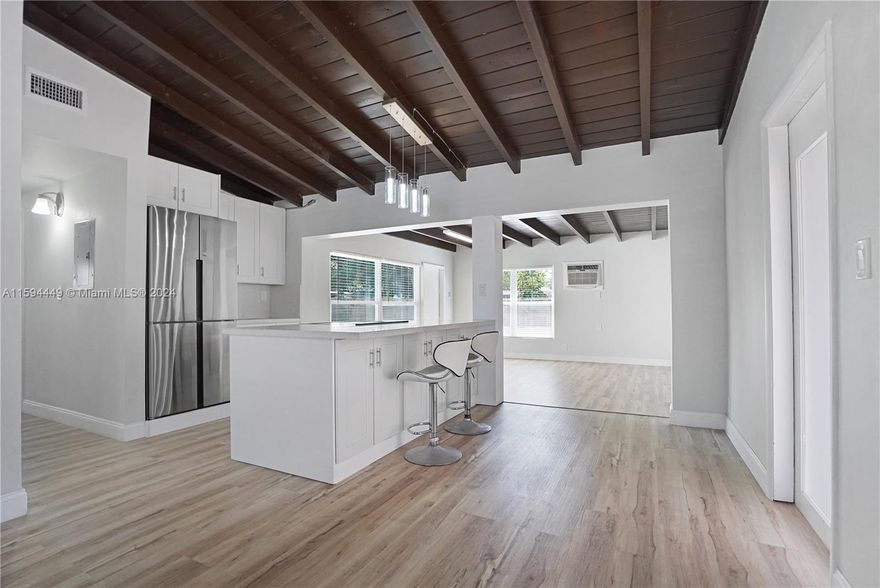 Stunning, spacious and completely remodeled 3 bedrooms, 2 bathrooms home with an open concept layout allowing lots of natural light and vaulted ceilings. This home has new: Roof, Central AC, kitchen cabinets, quartz countertops, Stainless Steel Appliances, waterproof vinyl floor, doors, light fixtures and more. This is one of the largest homes and lot on the block. The spacious and fenced in backyard can easily accommodate a pool! Experience the Fort Lauderdale lifestyle. Centrally located near downtown, FLL International Airport, Downtown Las Olas, beaches, restaurants and shopping. This could be your dream home, good for 1st time home buyers or investors, Airbnb and other short-term rentals. NO HOA. Hurry, this will not last, easy to visit!