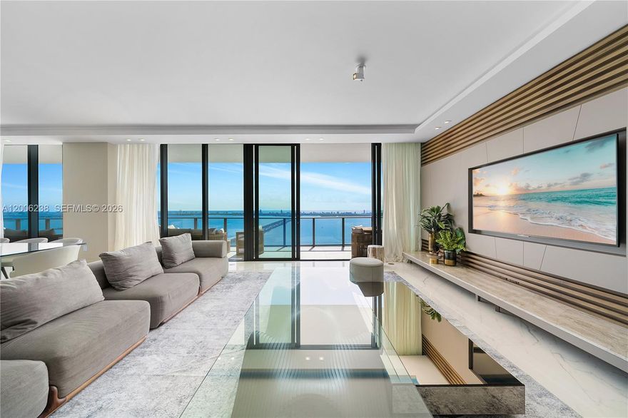 RARE PENTHOUSE OPPORTUNITY AT ONE PARAISO. PH5202 SHOWCASES UNOBSTRUCTED BAY AND SKYLINE VIEWS, SOARING CEILINGS, AND EXPANSIVE OUTDOOR LIVING SPACES. OFFERED FULLY FURNISHED WITH PREMIUM ARTEFACTO PIECES, THIS RESIDENCE DELIVERS A SEAMLESS, TURNKEY LIFESTYLE.

THIS UNIT INCLUDES 3 PARKING SPACES—AN EXCEPTIONAL ADVANTAGE IN THE BUILDING. ENJOY RESORT-STYLE LIVING WITH FIVE-STAR AMENITIES, INCLUDING MULTIPLE POOLS, SPA, STATE-OF-THE-ART FITNESS CENTER, TENNIS COURTS, AND EXCLUSIVE BEACH CLUB ACCESS.

IDEAL FOR END-USERS OR INVESTORS SEEKING A LUXURY, FULLY FINISHED PENTHOUSE IN EDGEWATER’S PREMIER WATERFRONT BUILDING. PRIVATE ELEVATOR FOYER ENTRY OPENS TO LIGHT-FILLED INTERIORS WITH FLOOR-TO-CEILING IMPACT GLASS AND OVERSIZED TERRACES PERFECT FOR ENTERTAINING OR RELAXING. GOURMET KITCHEN WITH TOP-OF-THE-LINE APPLIANCES, CUSTOM CABINETRY, AND STONE COUNTERTOPS. PRIMARY SUITE FEATURES A SPA-STYLE BATH AND GENEROUS CLOSET SPACE. FULL-SERVICE BUILDING WITH VALET, CONCIERGE, AND 24-HOUR SECURITY. PRIME LOCATION MINUTES FROM DESIGN DISTRICT, MIDTOWN, AND MIAMI BEACH. EASY TO SHOW.