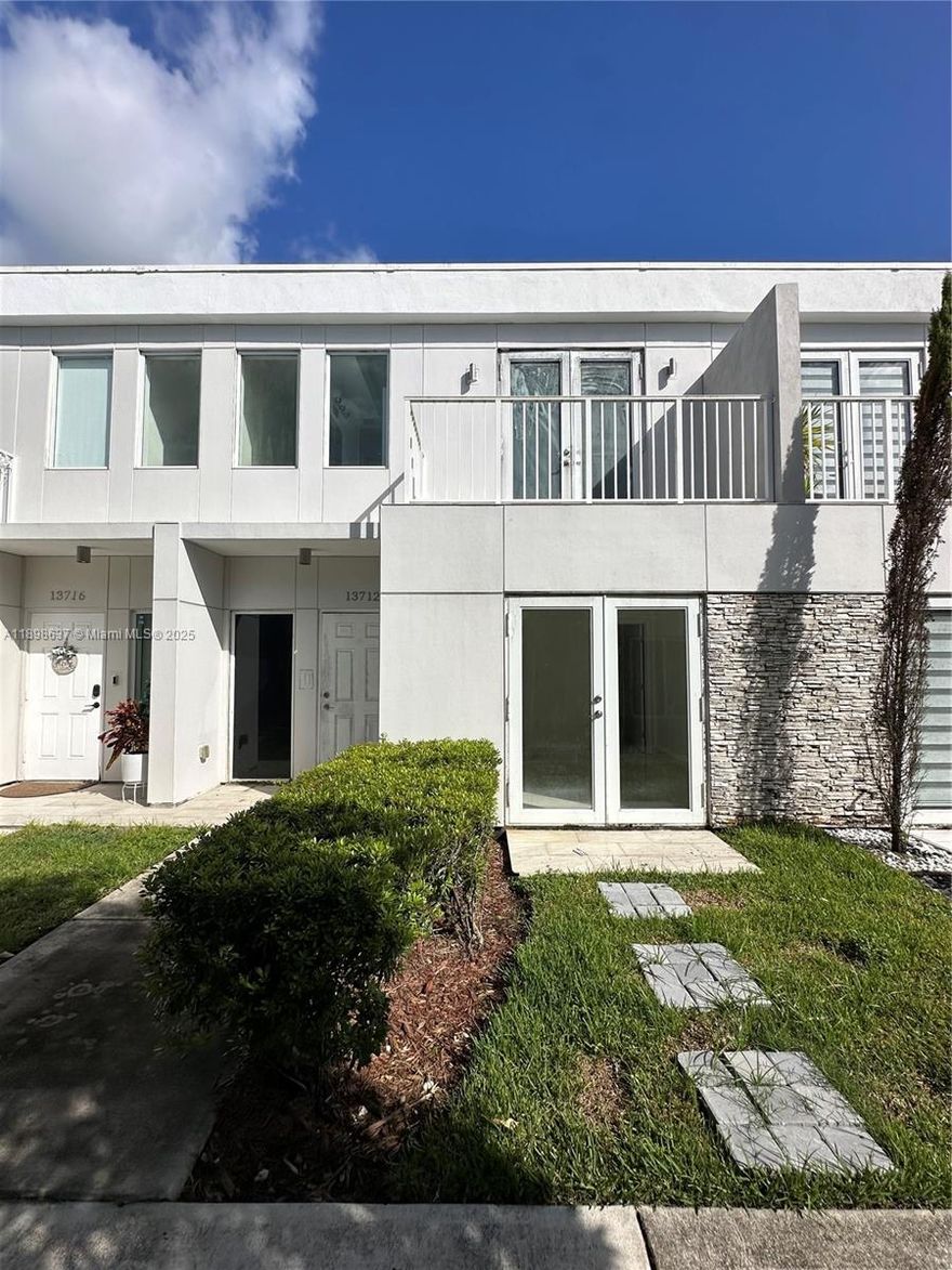 Beautiful and spacious townhouse with high ceilings, impact windows, and a modern open-concept kitchen. Features two master bedrooms, including one conveniently located on the first floor. Stylish, comfortable, and perfect for family living or guests. Ridiculously low HOA fee. Best value, you can rent it right away