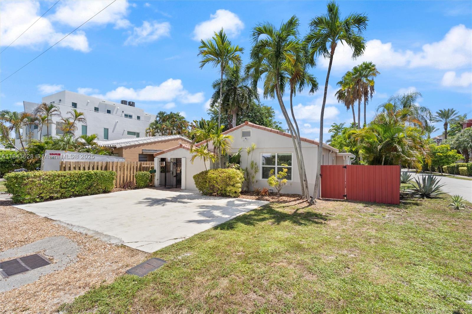 This charming Mid-Century POOL home on a corner lot in East Fort Lauderdale! Enjoy Las Olas Blvd’s vibrant mix of boutiques, cafes, & restaurants, Fort Lauderdale Beach, Holiday Park w/ IcePlex, Tennis Center, andWar Memorial Auditorium. Conveniently located near schools, highways, public transportation. This home features tile flooring throughout, a formal living & dining room with stained wood ceiling, a large upgraded kitchen with quartz countertops and stainless steel appliances, and a bright poolside family room. The primary bedroom includes an ensuite bath. Also includes a gated courtyard porch, utility and laundry rooms, impact windows, HVAC 2025, and tons of parking. Brand new plumbing throughout. VA and first-time buyer friendly. Excellent potential for short-term rentals.