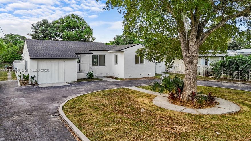 Rare opportunity to own a 5-Bedroom, 4-Bath Canal-Front Multi-Family Duplex in Biscayne Gardens! This spacious property features a large front yard with a circular driveway and plenty of parking. Front unit A is an updated 3BD/2BA with a new roof, impact windows and doors, hardwood flooring, brand-new kitchen with stainless steel appliances. A washer/dryer, and a Spacious master bedroom, closet space and bath then separate 2 bedrooms and bathroom on the other side. Back unit B offers a private 2BD/2BA which can be used as In-Law Suite. The home features an open layout with full kitchen, new appliances, fireplace, and its own washer/dryer. This unit also has private Wash/dryer. Gated backyard for outdoor enjoyment and views of the canal. Ideal for extended family or rental income opportunity. Close proximity to i-95 expresses, Tkpike, local restaurants, and parks. Look no further! Call to schedule showing.