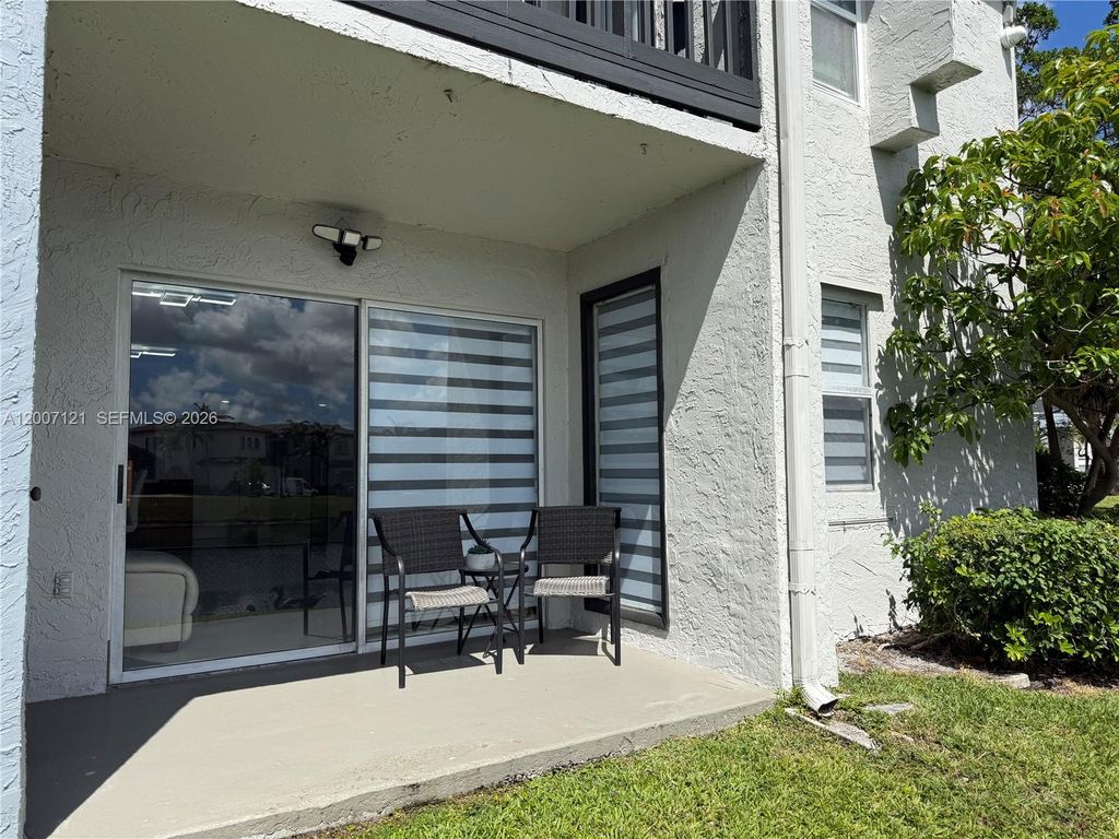 Photo of 601 SW 113th Way #601, Pembroke Pines, FL 33025 (MLS # A12007121)