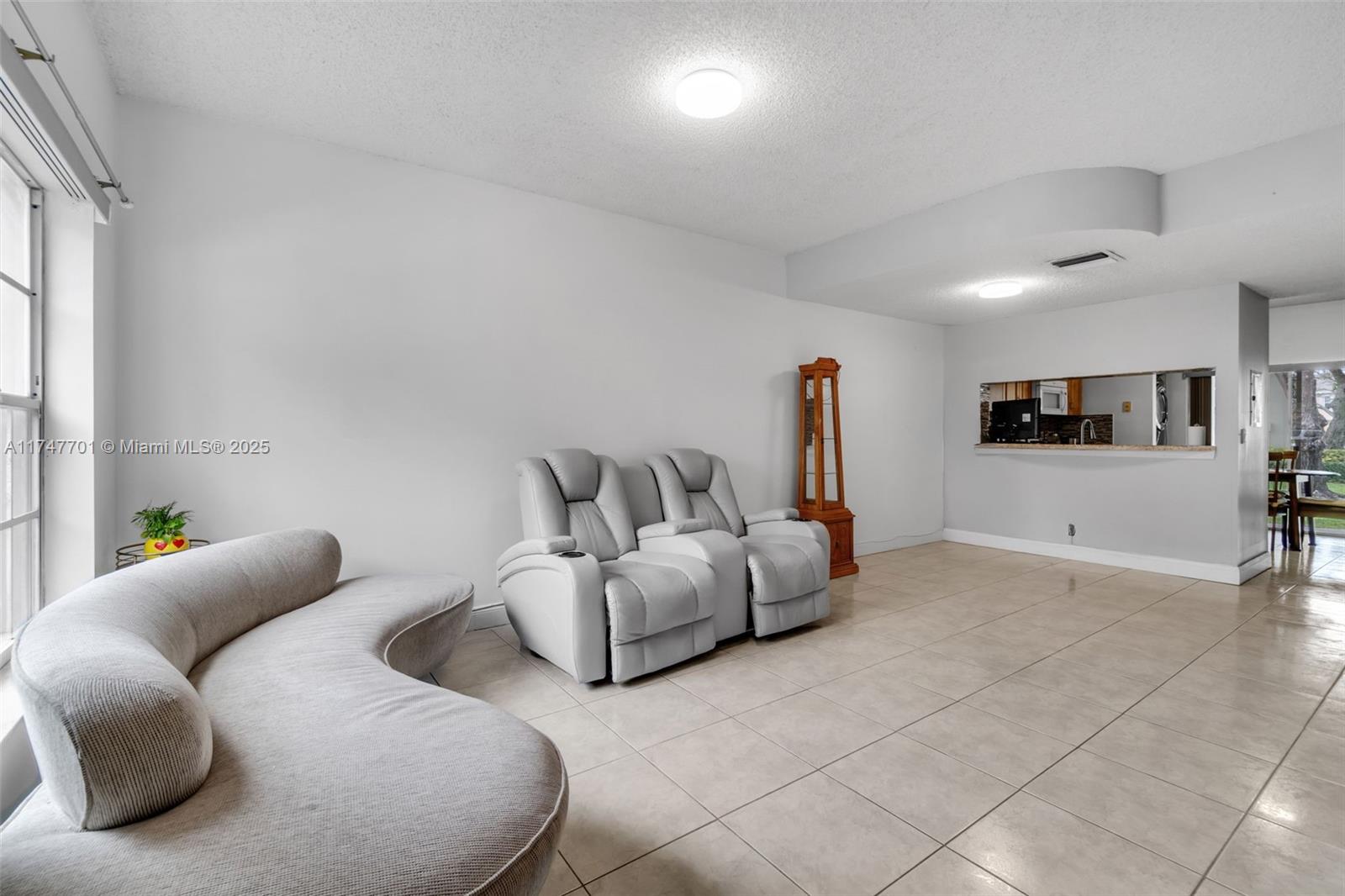 Welcome to this beautifully maintained and spacious 2-bedroom, 2.5-bathroom townhome in one of Weston’s most sought-after communities. This inviting residence boasts an open-concept living area, perfect fornentertaining, with large windows that let in natural light. The well-equipped kitchen features modern appliances, plenty of cabinetry, and a breakfast bar. Upstairs, you'll find two generously sized bedrooms, each with its own en-suite bathroom for ultimate privacy and convenience.Enjoy the additional half bath downstairs, perfect for guests. The private patio offers a peaceful retreat, ideal for enjoying the serene surroundings of this quiet neighborhood.Located just minutes from top-rated schools, parks, shopping, dining, and major highways. Don't miss this opportunity!