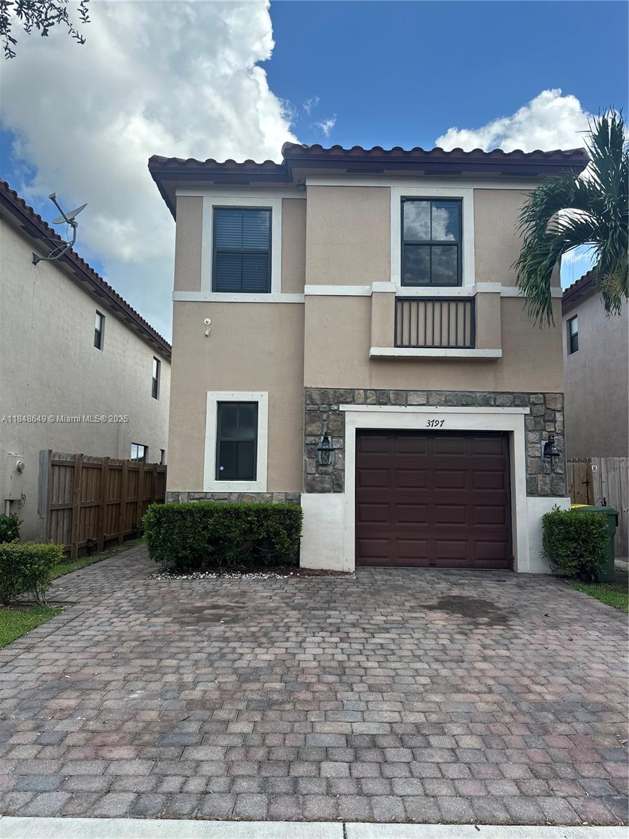 Charming townhouse with three beds and three baths.