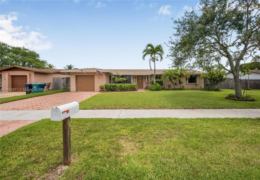 This charming Kendall home offers a comfortable and inviting living experience, perfect for families or anyone seeking a relaxed lifestyle. You'll find wood-like floors flowing beautifully throughout the main living areas, creating a warm and cohesive feel. The bedrooms feature cozy carpeting for added comfort. Elegant crown molding adds a touch of sophistication, and the kitchen boasts stylish granite countertops alongside a suite of modern stainless-steel appliances. Enjoy a spacious layout that provides ample room for both relaxation and entertaining, and step outside to your private oasis to take a refreshing dip in the pool.