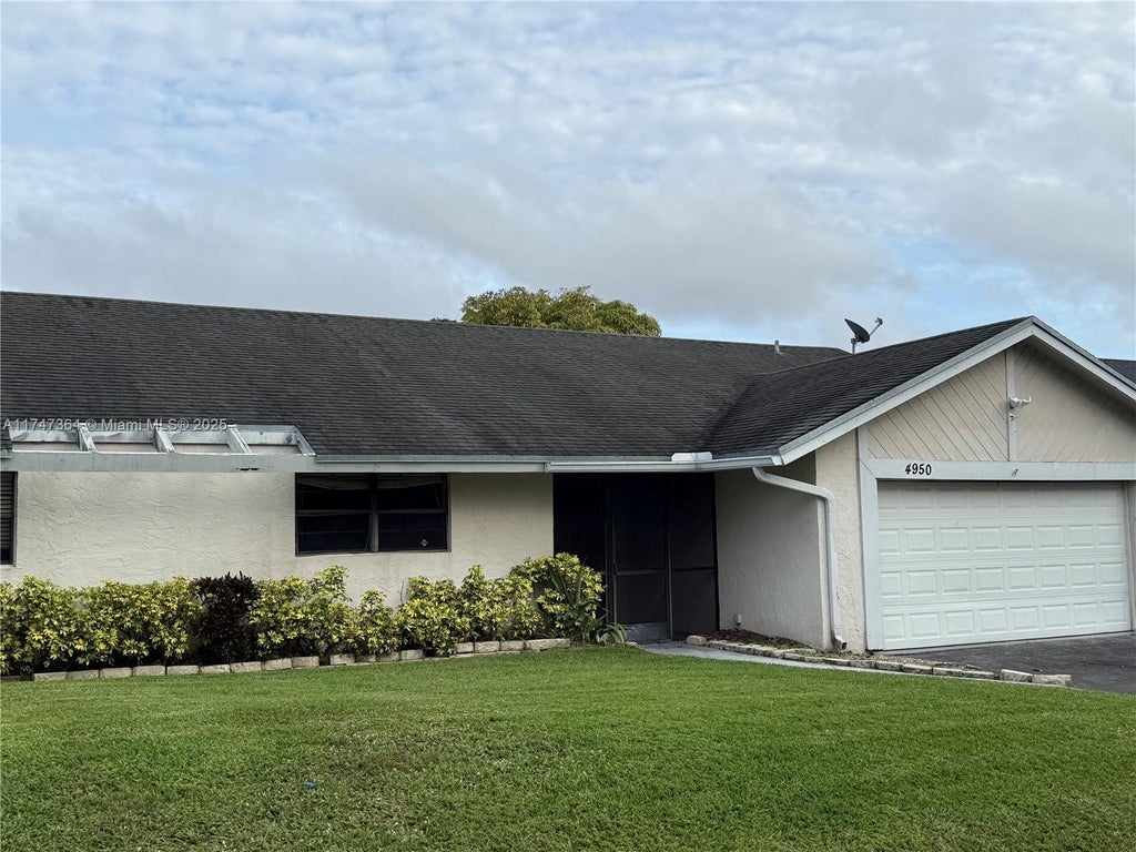 Photo of 4950 NW 72nd Ter, Lauderhill, FL 33319 (MLS # A11747364)