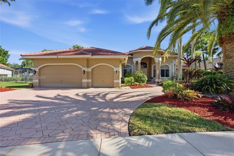 Photo of 2442 Poinciana Ct, Weston, FL 33327 (MLS # A11937588)