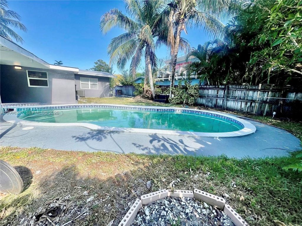 Photo of 1649 NE 8th Ave, Fort Lauderdale, FL 33305 (MLS # A12008237)