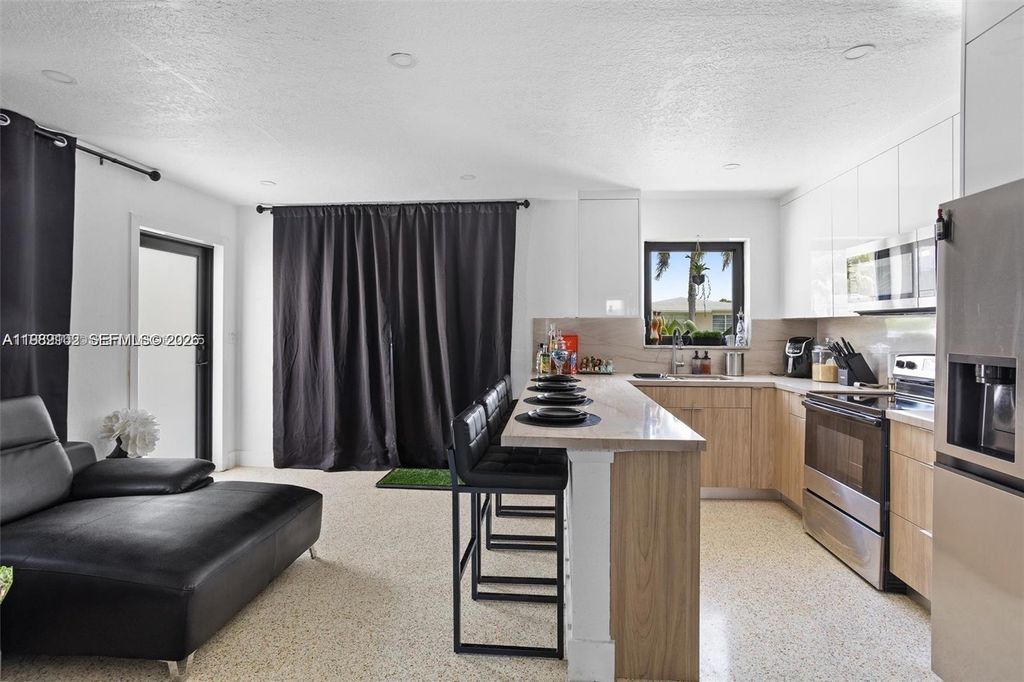 Photo of 70 NE 186th Ter, Miami, FL 33179 (MLS # A11989102)