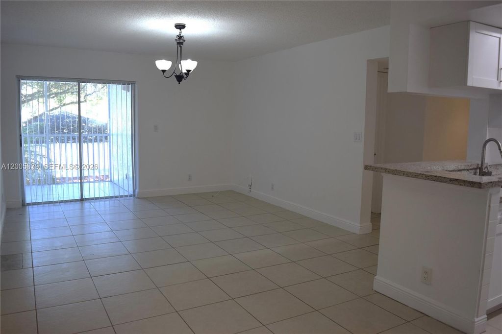 Photo of 5628 Rock Island Rd #185, Tamarac, FL 33319 (MLS # A12005039)