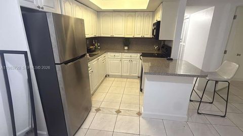 Photo of 3090 Coral Springs Dr #1, Coral Springs, FL 33065 (MLS # A11983728)