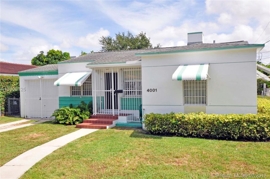 An adorable corner lot home, in immaculate condition, on a huge (almost 10,000 sf) lot in a great central location. Enjoy gleaming wood floors, central a/c, spacious kitchen w/ pantry, & kitchen pass-thru to a delightful Florida Rm w/ grand vistas of the deep fenced backyard. There are 2 intimate bedrooms and one sparkling bathroom on the East side and a private den (an ideal guest/3rd bedroom) adjacent the Living Rm. The laundry facilities are located in the one-car garage with room for abundant storage. This Ready-To-Move-In home will just make you "smile". Priced so you can update to your personal taste. Don't miss this opportunity for quick ownership!